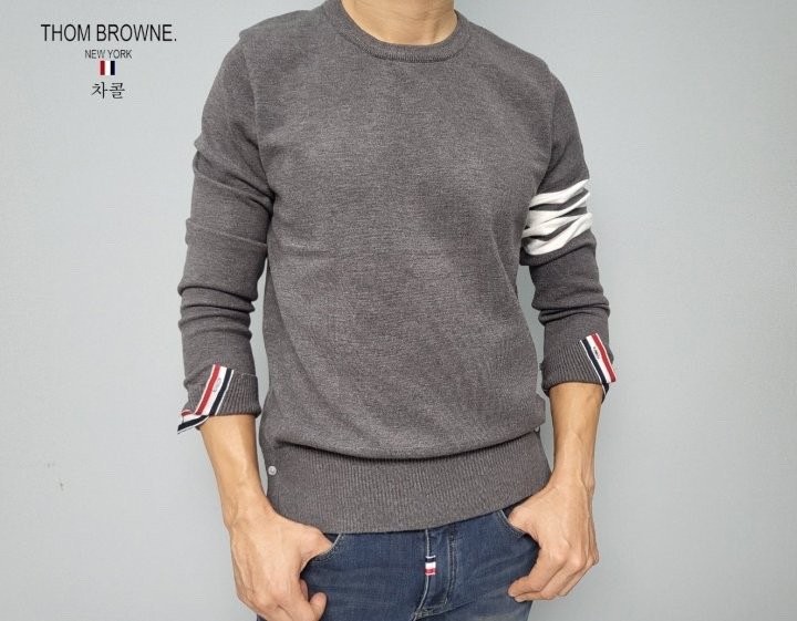 TB 사선 라운드 니트